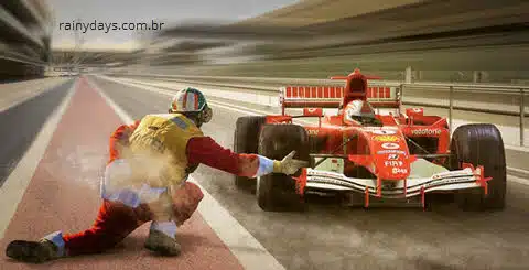 Carro de F1 passando no pit stop, assista corridas de Fórmula 1 ao vivo pela internet