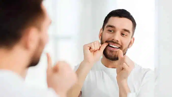 Como usar o fio dental corretamente